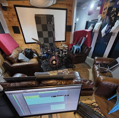 Andy Cooper recording drums for This Time Will Pass Anyway, 2025.